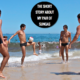 Men wearing a pair of sungas on Ipanema Beach, Brazil