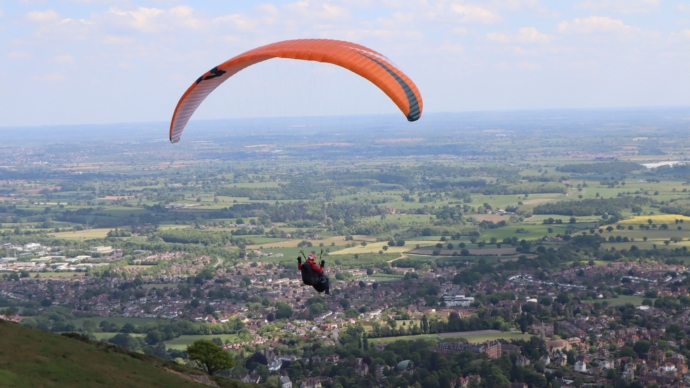 A parascender takes off from Worcestershire Beacon