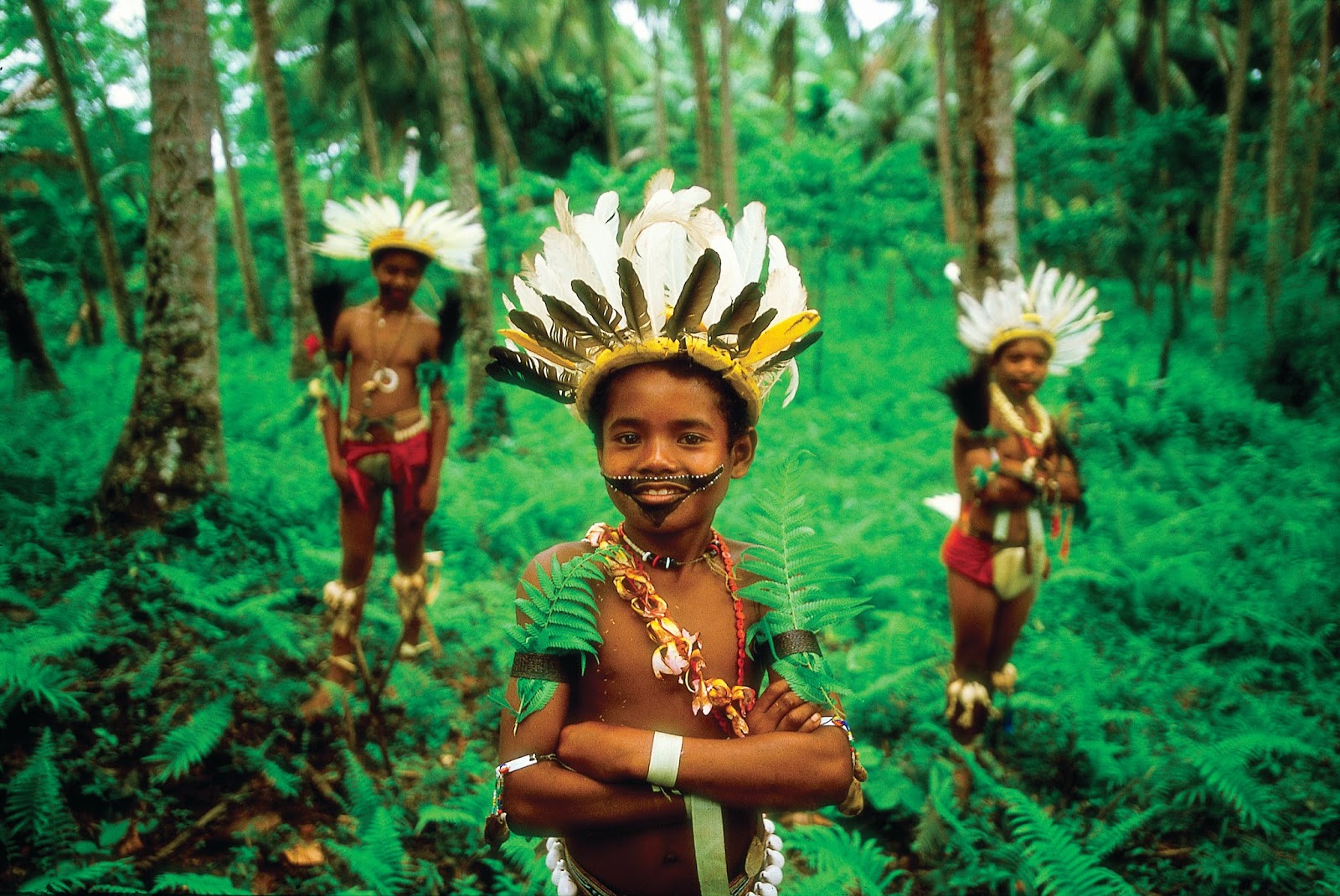 Young Trobriand Island boys from Kiriwina Island in traditional bilas - Papua New Guinea