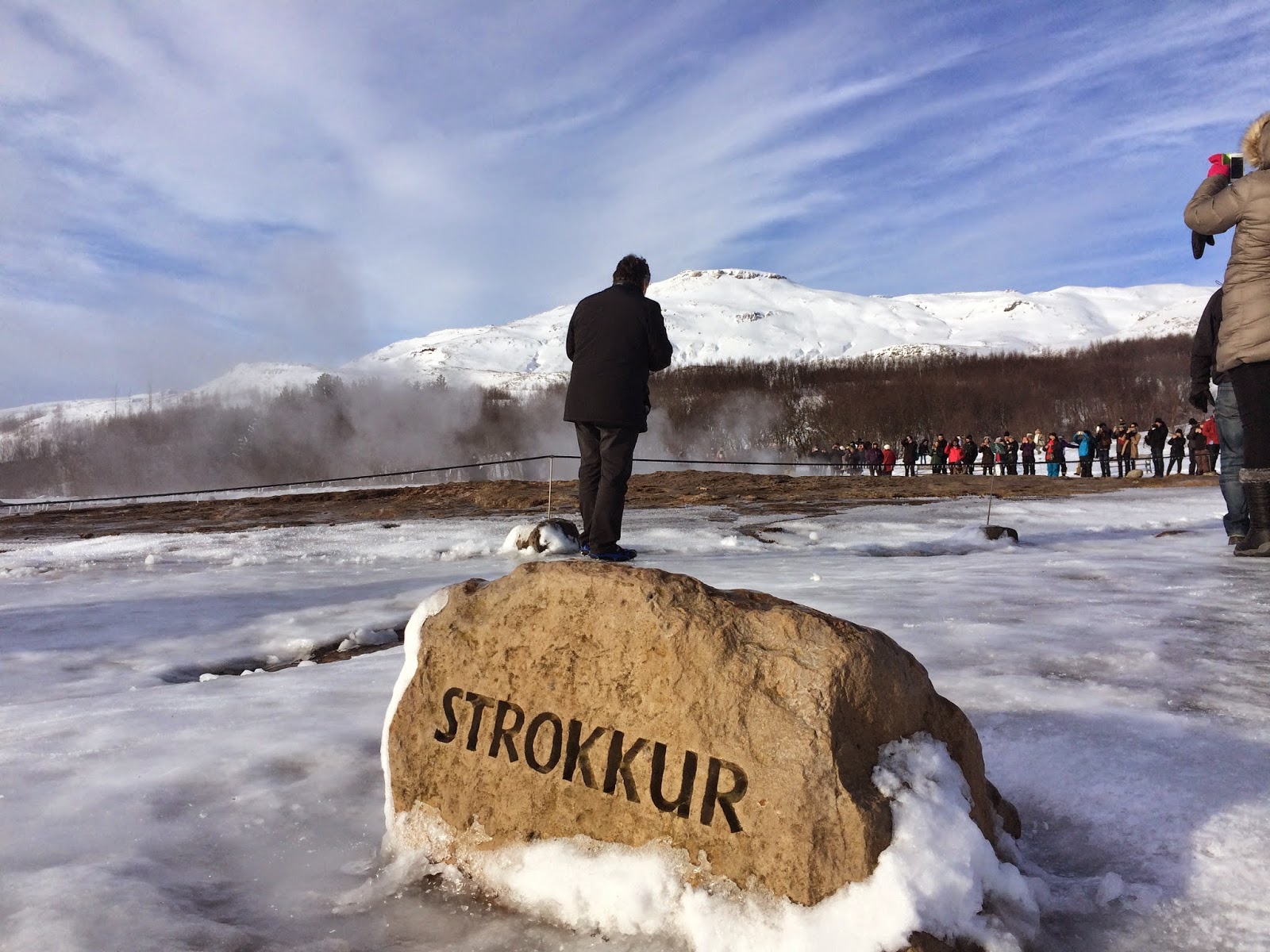 Crowds gather around the Strokkur geyser - Golden Circle Tour - Iceland