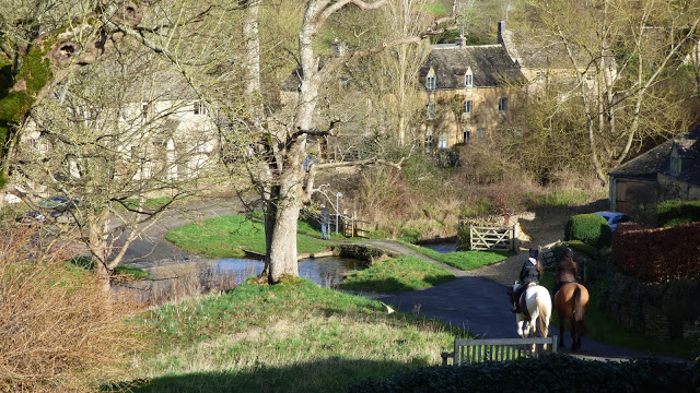 Horses head down to the ford, which crosses the River Eye - Upper Slaughter, Cotswolds