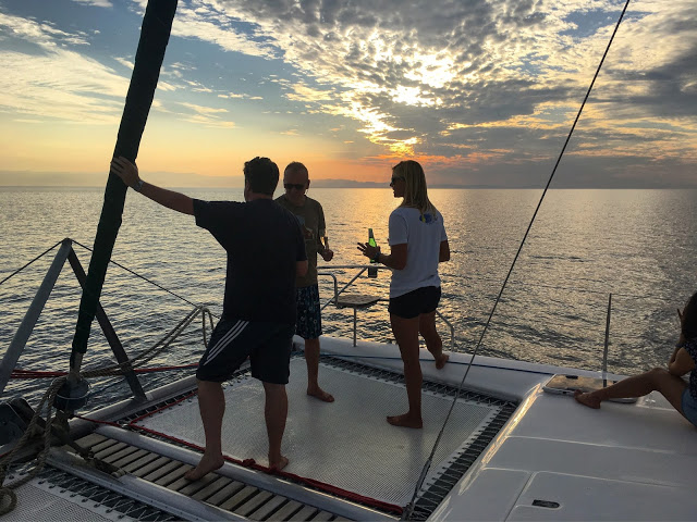 Group drinks on board Mufasa - Danforth Yachting