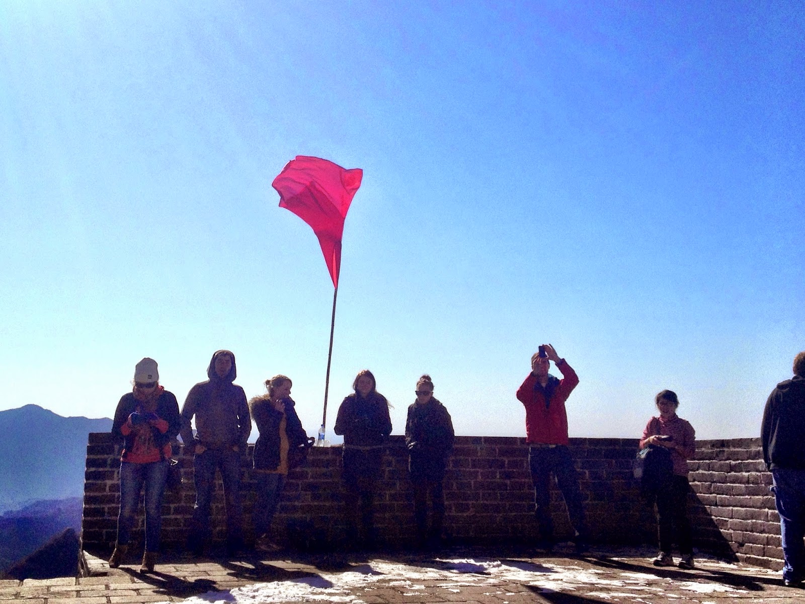 Blue sky and a red flag - group shot on the Great Wall