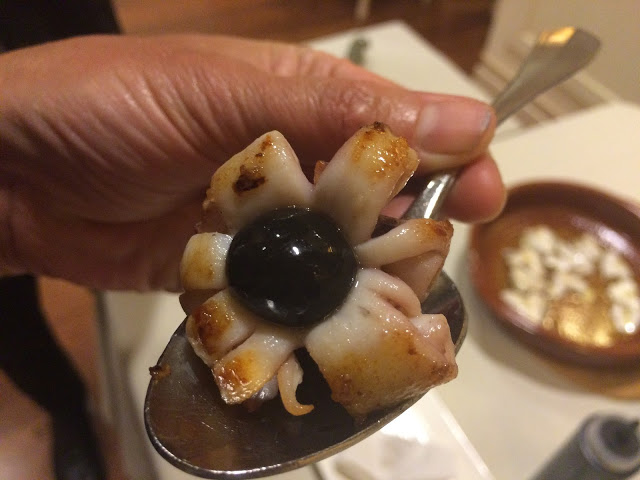 Fried squid with ink wrapped in a milk and seaweed layer, keeping the ink intact until you bite into it - Etxanobe, Bilbao