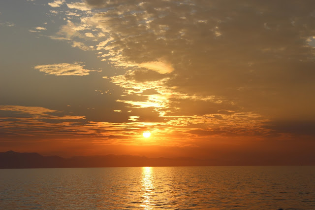 Watching the sun setting over Lake Malawi from Mufasa