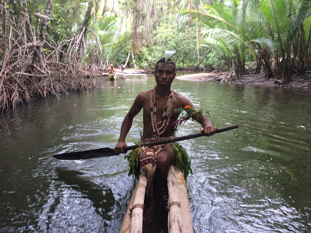 Canoeing through the mangroves near Tufi, Papua New Guinea