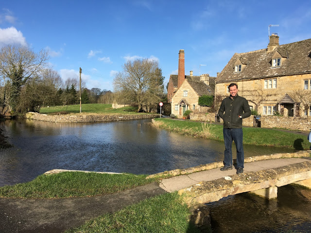 Simon stood on the little stone bridge which leads to the Old Mill House - Lower Slaughter, Cotswolds